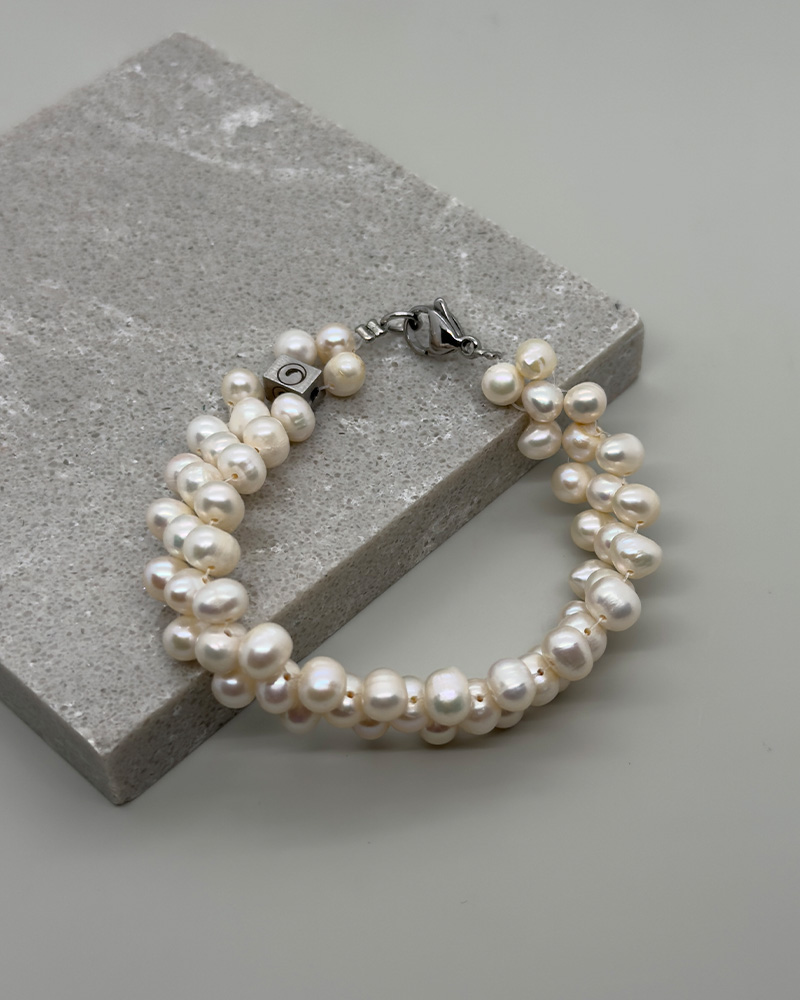 Pulsera doble de perlas cultivadas y cierre de acero