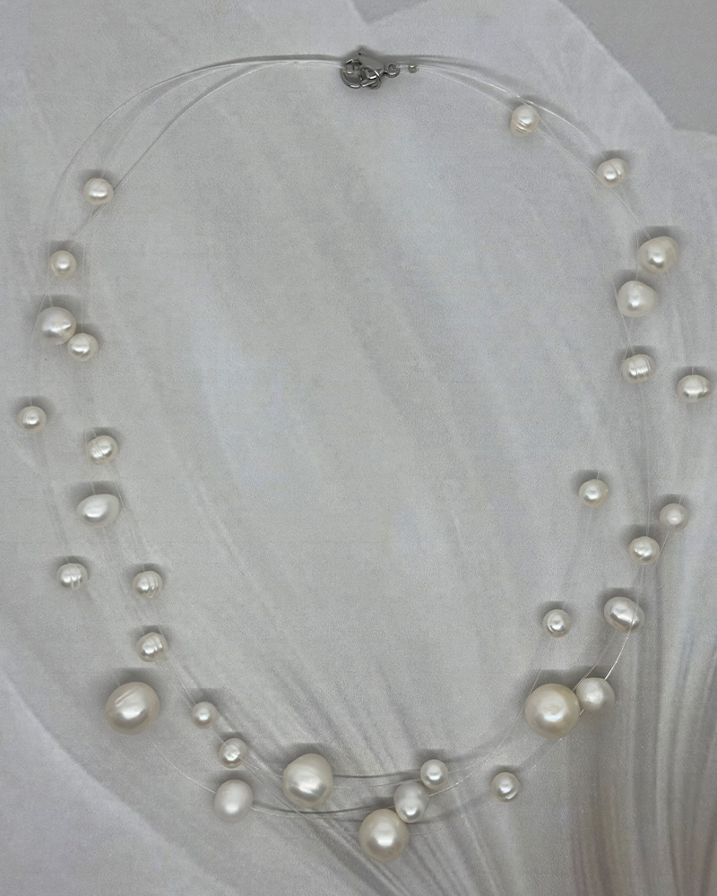 Collar 3 lineas polimero sintético y perlas diferentes tamaños