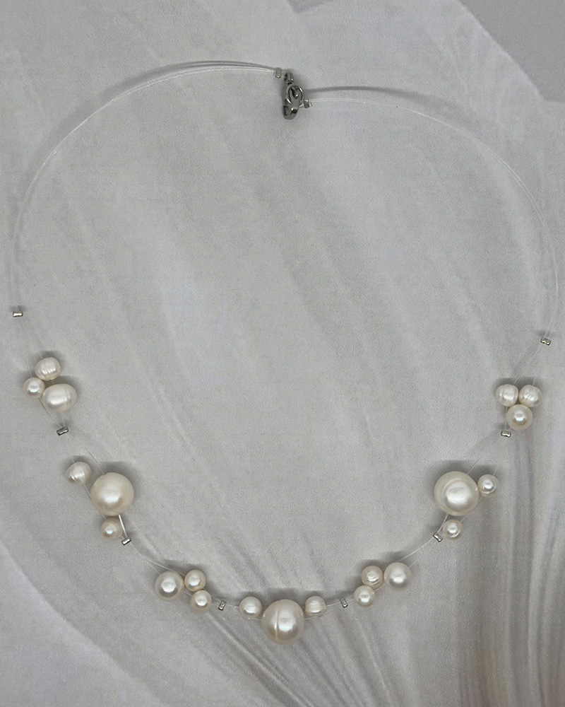 Collar 3 lineas polimero sintético y perla grande