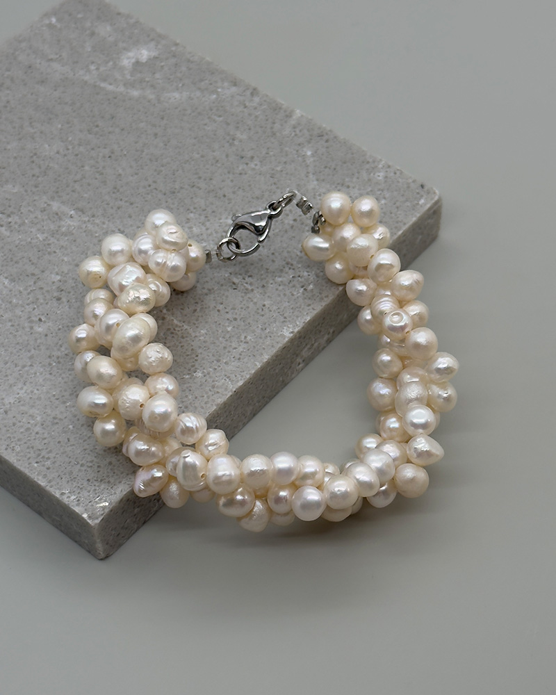 Pulsera trenzada con cierre de acero y perla de 4mm
