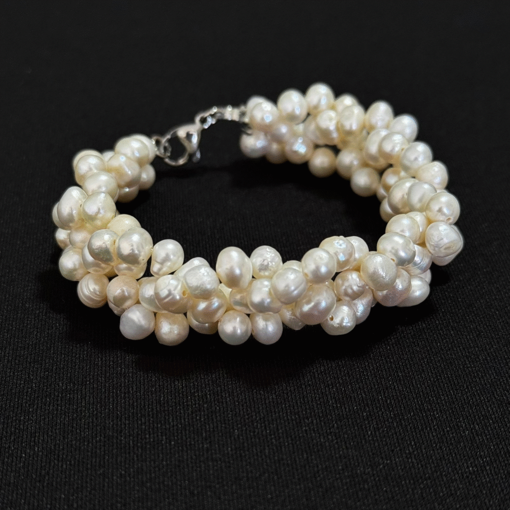 Pulsera trenzada con cierre de acero y perla de 4mm