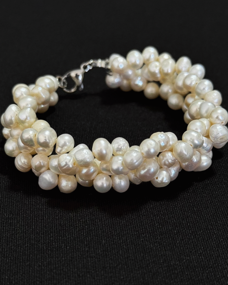 Pulsera trenzada con cierre de acero y perla de 4mm