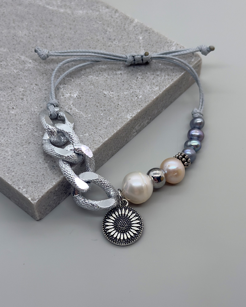 Pulsera ajustable con perlas cultivadas y cadena gruesa de acero