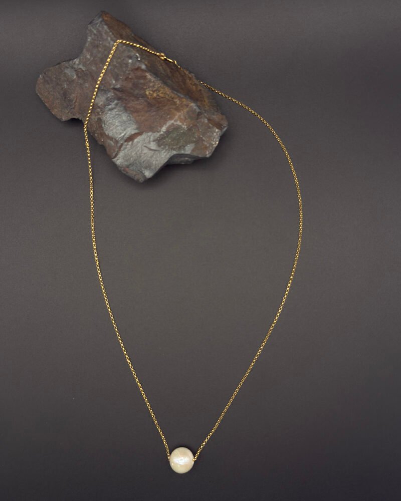 Cadena de oro 10k con una perla cultivada de 12mm